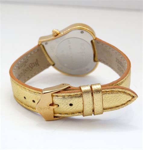 ysl heart shaped watch
